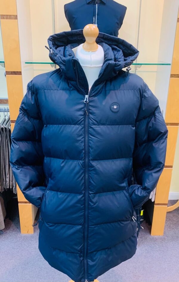 Navy mid length puff jacket with zip and hood